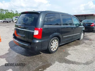 2013 Chrysler Town & Country Touring z VIN 2C4RC1BG5DR742792, wystawiony jako IAAI lot #42005481 z przebiegiem 204 002 mil mil oraz . Historia ofert i sprzedaży dostępna na DreamBid. Obrazek 4.