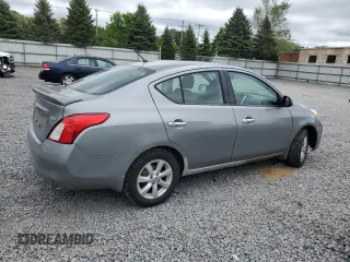 2014 Nissan Versa S Plus z VIN 3N1CN7AP0EL816013, wystawiony jako Copart lot #59020155 z przebiegiem 176 329 mil mil oraz Czysty tytuł • Clean title. Historia ofert i sprzedaży dostępna na DreamBid. Obrazek 3.
