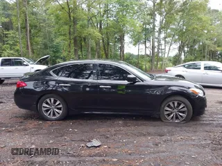 2011 Infiniti M37 with VIN JN1BY1AR5BM374686, listed as a IAAI auction lot 40399732 with 208,337 mi miles. Bid and sale history available at carsss.com. Image 12.