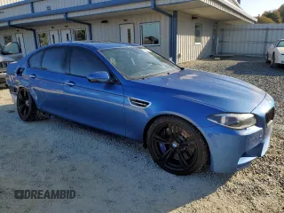 2016 BMW M5 with VIN WBSFV9C53GG343466, listed as a Copart auction lot 76460794 with 66,351 mi miles and Salvage Title. Bid and sale history available at carsss.com. Image 4.