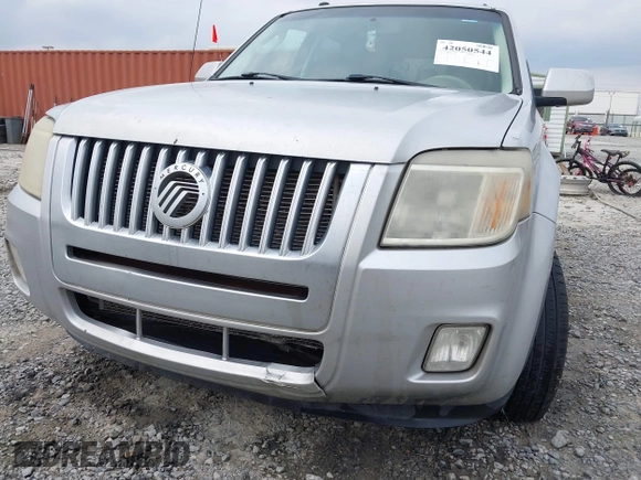 2009 Mercury Mariner Premier z VIN 4M2CU87G59KJ25154, wystawiony jako IAAI lot #42050544 z przebiegiem 210 905 mil mil oraz . Historia ofert i sprzedaży dostępna na DreamBid. Obrazek 6.