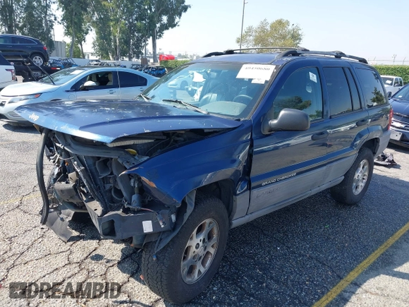1999 Jeep Grand Cherokee Laredo z VIN 1J4G258S1XC787295, wystawiony jako IAAI lot #40450680 z przebiegiem Nie podano mil oraz . Historia ofert i sprzedaży dostępna na DreamBid. Obrazek 2.