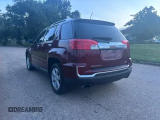 2017 GMC Terrain SLT z VIN 2GKFLUE34H6192039, wystawiony jako Copart lot #60246395 z przebiegiem 146 486 mil mil oraz Czysty tytuł • Clean title. Historia ofert i sprzedaży dostępna na DreamBid. Obrazek 3.