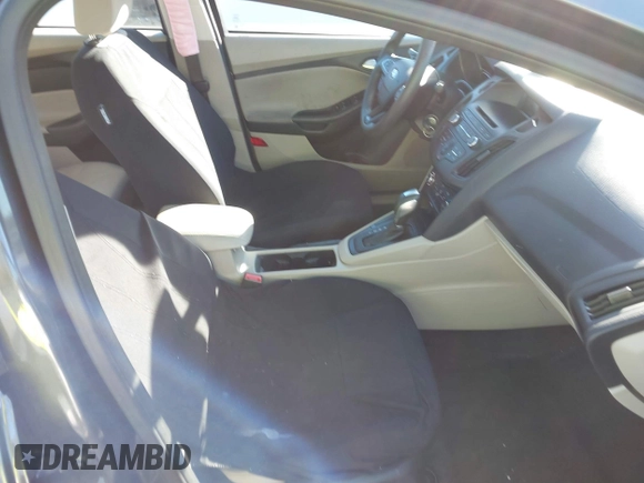 2015 Ford Focus SE with VIN 1FADP3F26FL280298, listed as a IAAI auction lot 40852000 with 144,805 mi miles and . Bid and sale history available at DreamBid. Image 5.