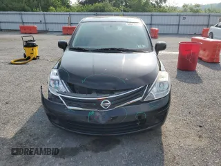 2011 Nissan Versa S z VIN 3N1BC1CP4BL509998, wystawiony jako Copart lot #58521975 z przebiegiem 118 689 mil mil oraz Szkoda całkowita • Salvage title. Historia ofert i sprzedaży dostępna na DreamBid. Obrazek 5.