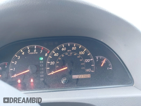 2006 Toyota Camry LE z VIN 4T1BF30K96U115963, wystawiony jako IAAI lot #41616833 z przebiegiem 237 404 mil mil oraz . Historia ofert i sprzedaży dostępna na DreamBid. Obrazek 7.