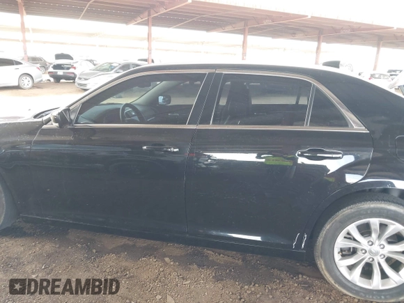 2016 Chrysler 300 Anniversary Edition with VIN 2C3CCAAG4GH141217, listed as a IAAI auction lot 42121809 with 74,739 mi miles and . Bid and sale history available at DreamBid. Image 15.