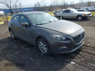 2014 Mazda 3 i Grand Touring with VIN JM1BM1M75E1207754, listed as a IAAI auction lot 41698583 with 128,887 mi miles and . Bid and sale history available at DreamBid. Image 1.