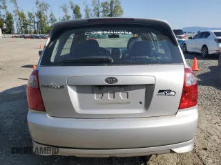 2005 Kia Spectra with VIN KNAFE161355121968, listed as a Copart auction lot 54621465 with 221,951 mi miles and Clean Title. Bid and sale history available at carsss.com. Image 6.