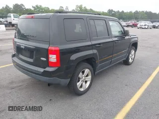 2014 Jeep Patriot Latitude with VIN 1C4NJRFB7ED713462, listed as a IAAI auction lot 42036671 with 116,276 mi miles. Bid and sale history available at carsss.com. Image 4.