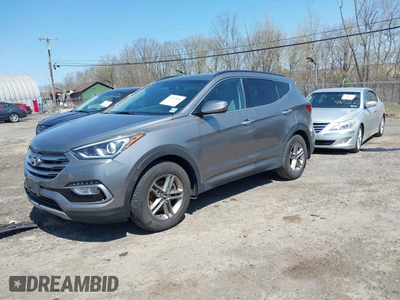 2017 Hyundai Santa Fe 2.4L z VIN 5NMZUDLB7HH015347, wystawiony jako IAAI lot #42035606 z przebiegiem 118 305 mil mil oraz . Historia ofert i sprzedaży dostępna na DreamBid. Obrazek 17.