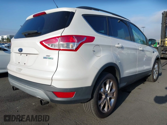 2013 Ford Escape SE with VIN 1FMCU0GX3DUB96899, listed as a IAAI auction lot 42266671 with 92,181 mi miles and . Bid and sale history available at DreamBid. Image 4.