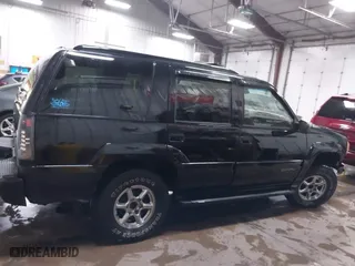 2000 GMC Denali with VIN 1GKEK13R9YR163824, listed as a IAAI auction lot 41245808 with 206,773 mi miles. Bid and sale history available at carsss.com. Image 13.