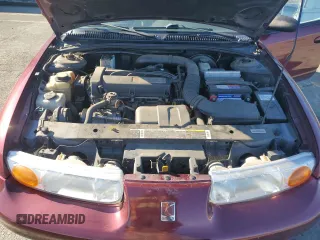 2001 Saturn SL z VIN 1G8ZK54731Z305098, wystawiony jako Copart lot #83875424 z przebiegiem 82 879 mil mil oraz Tytuł czysty. Historia ofert i sprzedaży dostępna na DreamBid. Obrazek 11.