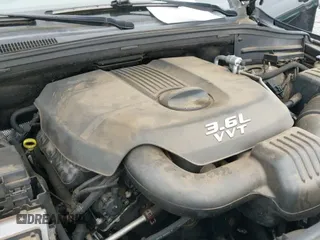 2012 Jeep Grand Cherokee Laredo z VIN 1C4RJEAG1CC229237, wystawiony jako IAAI lot #41613422 z przebiegiem 206 633 mil mil oraz . Historia ofert i sprzedaży dostępna na DreamBid. Obrazek 19.