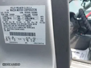 2005 Mazda Tribute s with VIN 4F2YZ96125KM10503, listed as a IAAI auction lot 41659255 with 68,855 mi miles. Bid and sale history available at carsss.com. Image 9.