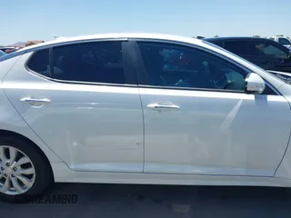 2015 Kia Optima EX z VIN 5XXGN4A72FG421289, wystawiony jako IAAI lot #42692024 z przebiegiem 91 000 mil mil oraz . Historia ofert i sprzedaży dostępna na DreamBid. Obrazek 13.