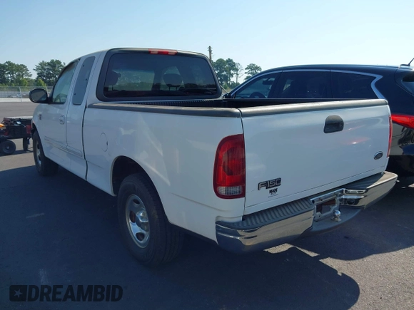 2003 Ford F-150 XL with VIN 1FTRX17W13NB93902, listed as a IAAI auction lot 42670081 with 145,918 mi miles and . Bid and sale history available at DreamBid. Image 3.