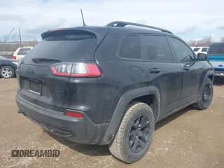 2022 Jeep Cherokee X with VIN 1C4PJMCX0ND527533, listed as a IAAI auction lot 41674822 with 36,300 mi miles. Bid and sale history available at carsss.com. Image 4.