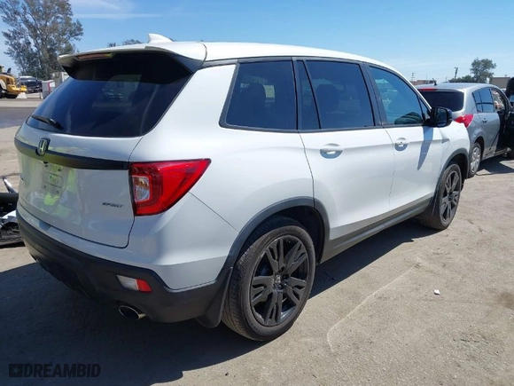 2021 Honda Passport Sport with VIN 5FNYF7H26MB004609, listed as a IAAI auction lot 41882670 with 77,934 mi miles. Bid and sale history available at carsss.com. Image 4.
