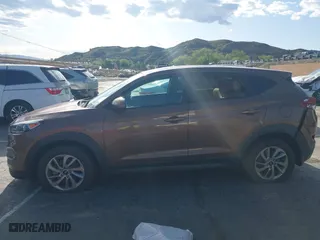 2016 Hyundai Tucson SE with VIN KM8J23A47GU166435, listed as a IAAI auction lot 41952751 with 66,785 mi miles. Bid and sale history available at carsss.com. Image 13.