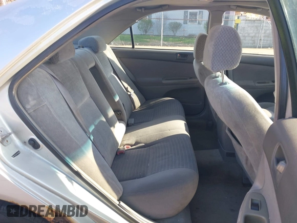 2004 Toyota Camry LE with VIN 4T1BE32K64U282875, listed as a IAAI auction lot 42038006 with 238,605 mi miles. Bid and sale history available at carsss.com. Image 8.