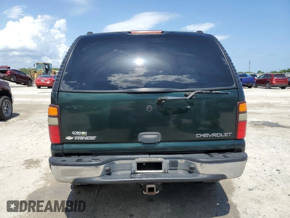 2004 Chevrolet Tahoe LT with VIN 1GNEC13Z14R191384, listed as a Copart auction lot 51371855 with 213,802 mi miles and Salvage title. Bid and sale history available at DreamBid. Image 6.