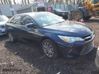 2016 Toyota Camry Hybrid LE with VIN 4T1BD1FKXGU183143, listed as a IAAI auction lot 42043538 with 132,321 mi miles. Bid and sale history available at carsss.com. Image 1.