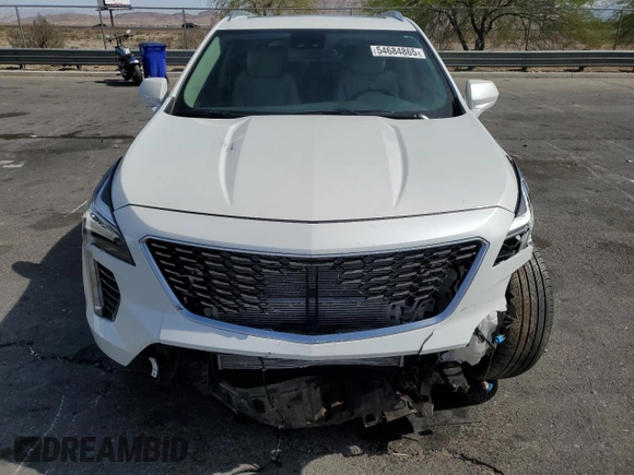 2023 Cadillac XT4 FWD Luxury with VIN 1GYAZAR46PF134602, listed as a Copart auction lot 54684865 with 13,221 mi miles and Salvage title. Bid and sale history available at DreamBid. Image 5.