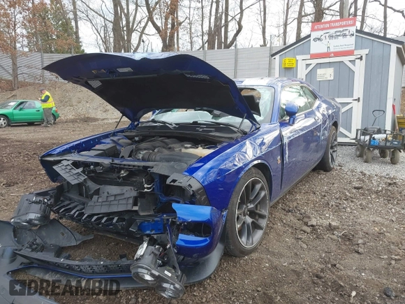 2021 Dodge Challenger R/T Scat Pack Widebody z VIN 2C3CDZFJXMH615361, wystawiony jako IAAI lot #41911374 z przebiegiem 27 159 mil mil oraz . Historia ofert i sprzedaży dostępna na DreamBid. Obrazek 6.