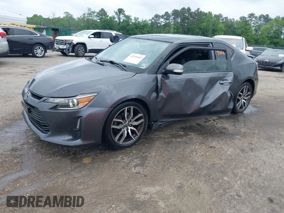 2015 Scion tC z VIN JTKJF5C75F3089895, wystawiony jako IAAI lot #42226465 z przebiegiem 106 694 mil mil oraz . Historia ofert i sprzedaży dostępna na DreamBid. Obrazek 2.
