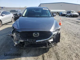 2018 Mazda CX-5 Touring with VIN JM3KFACM0J1430643, listed as a Copart auction lot 50725325 with 55,674 mi miles and Salvage Title. Bid and sale history available at carsss.com. Image 5.