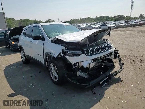 2023 Jeep Compass Latitude z VIN 3C4NJDBN6PT562209, wystawiony jako Copart lot #59638715 z przebiegiem 45 360 mil mil oraz Szkoda całkowita • Salvage title. Historia ofert i sprzedaży dostępna na DreamBid. Obrazek 14.