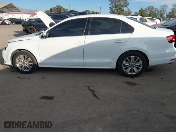 2016 Volkswagen Jetta Sedan 1.4T SE with VIN 3VWD67AJXGM365869, listed as a IAAI auction lot 41261109 with 59,325 mi miles. Bid and sale history available at carsss.com. Image 15.
