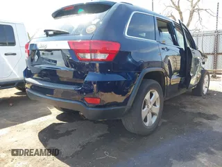 2013 Jeep Grand Cherokee Laredo with VIN 1C4RJEAG9DC621061, listed as a IAAI auction lot 41846537 with 107,264 mi miles. Bid and sale history available at carsss.com. Image 4.