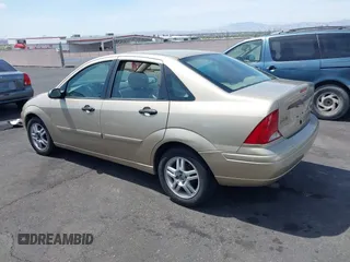 2002 Ford Focus SE with VIN 1FAFP343X2W287803, listed as a IAAI auction lot 41980504 with 63,748 mi miles and . Bid and sale history available at carsss.com. Image 3.