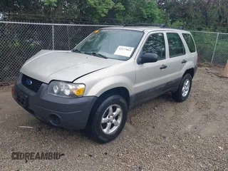 2006 Ford Escape XLS with VIN 1FMYU02ZX6KA73663, listed as a IAAI auction lot 42177043 with 230,878 mi miles and . Bid and sale history available at DreamBid. Image 2.