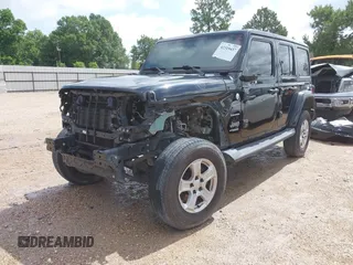 2019 Jeep Wrangler Unlimited Sahara with VIN 1C4HJXEN9KW514880, listed as a IAAI auction lot 42319437 with 70,186 mi miles and . Bid and sale history available at DreamBid. Image 2.