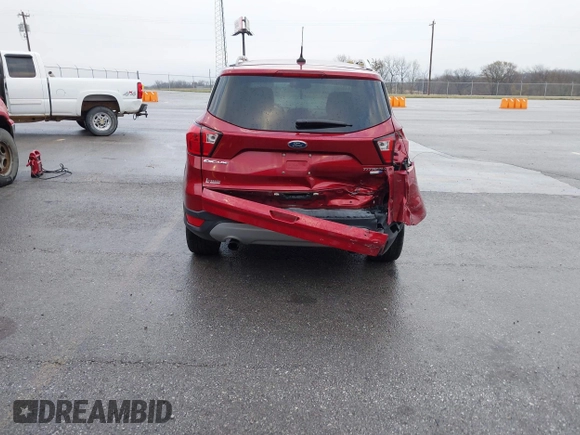 2019 Ford Escape Titanium z VIN 1FMCU9J99KUA18880, wystawiony jako IAAI lot #40830436 z przebiegiem 117 499 mil mil oraz . Historia ofert i sprzedaży dostępna na DreamBid. Obrazek 16.