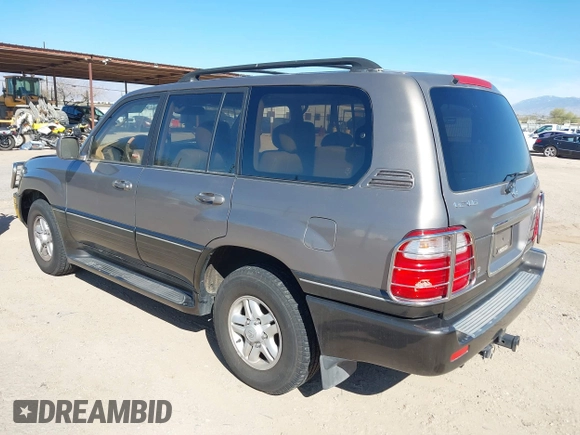 2000 Lexus LX 470 with VIN JT6HT00WXY0079873, listed as a IAAI auction lot 41605770 with 302,758 mi miles and . Bid and sale history available at DreamBid. Image 3.