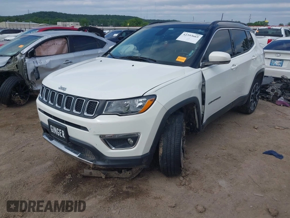 2018 Jeep Compass Limited with VIN 3C4NJDCBXJT298469, listed as a IAAI auction lot 42393665 with 61,589 mi miles and . Bid and sale history available at DreamBid. Image 2.