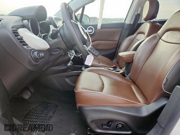 2018 FIAT 500X Lounge with VIN ZFBCFXDB9JP651302, listed as a Copart auction lot 59435875 with 63,186 mi miles and Salvage title. Bid and sale history available at DreamBid. Image 7.