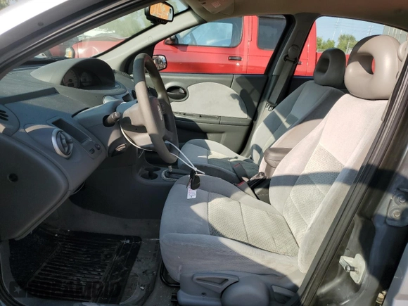 2007 Saturn ION ION 3 with VIN 1G8AL55F77Z129830, listed as a Copart auction lot 70704904 with 129,909 mi miles and Salvage Title. Bid and sale history available at DreamBid. Image 7.