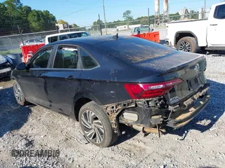 2020 Volkswagen Jetta SEL z VIN 3VWE57BU2LM093697, wystawiony jako IAAI lot #40437984 z przebiegiem 76 803 mil mil oraz . Historia ofert i sprzedaży dostępna na DreamBid. Obrazek 15.