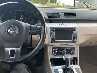 2010 Volkswagen Passat Sedan Komfort with VIN WVWJK7AN5AE140745, listed as a Copart auction lot 77474744 with 174,409 mi miles and Clean Title. Bid and sale history available at carsss.com. Image 9.