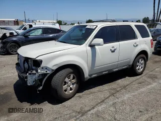 2010 Ford Escape Limited с VIN 1FMCU0EG2AKD20719, выставлен на аукционе Copart как лот 57350295 с пробегом 133 260 миль миль и Списание • Salvage title. История ставок и продаж доступна на DreamBid. Изображение 1.