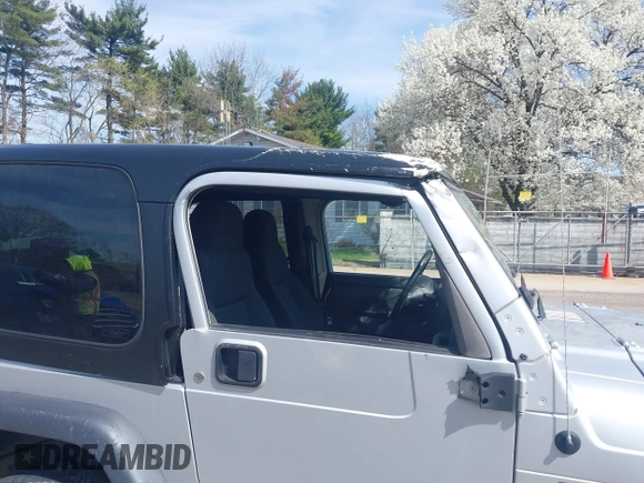 2006 Jeep Wrangler X with VIN 1J4FA39S16P787614, listed as a IAAI auction lot 41992315 with 61,788 mi miles. Bid and sale history available at carsss.com. Image 6.