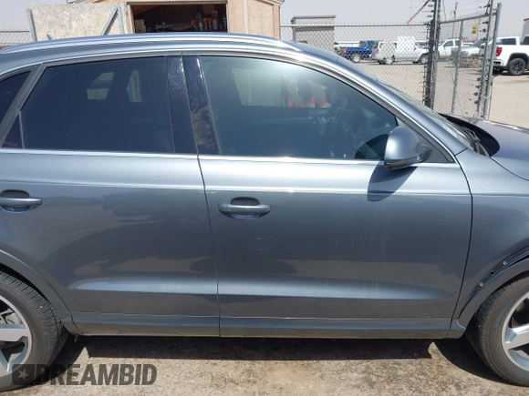 2015 Audi Q3 Premium Plus with VIN WA1EFCFSXFR011133, listed as a IAAI auction lot 42545916 with 82,980 mi miles and . Bid and sale history available at DreamBid. Image 13.