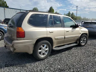 2005 GMC Envoy SLT with VIN 1GKDS13S552135280, listed as a Copart auction lot 68097344 with 165,924 mi miles and Salvage Title. Bid and sale history available at carsss.com. Image 3.