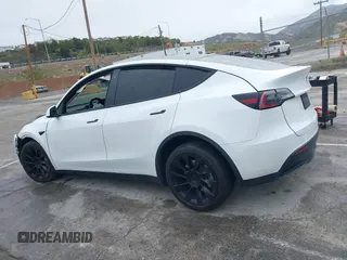 2020 Tesla Model Y Long Range with VIN 5YJYGDEE2LF022484, listed as a IAAI auction lot 41798662 with 108,978 mi miles and . Bid and sale history available at DreamBid. Image 14.